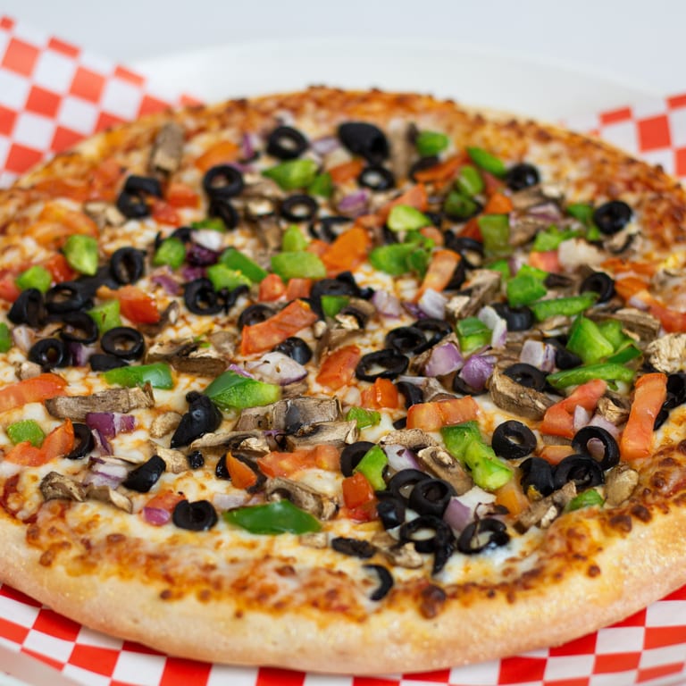 Savor our veggie pizza